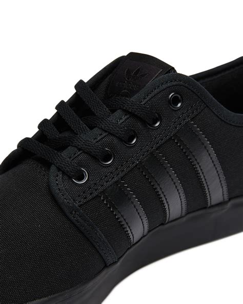 adidas black shoes for women.